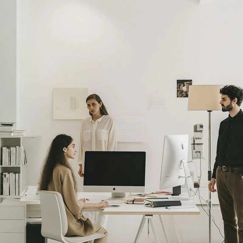 Team adapting plans during a business strategy meeting